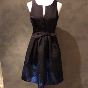 Eva Franco sleeveless dress with blue metallic hem